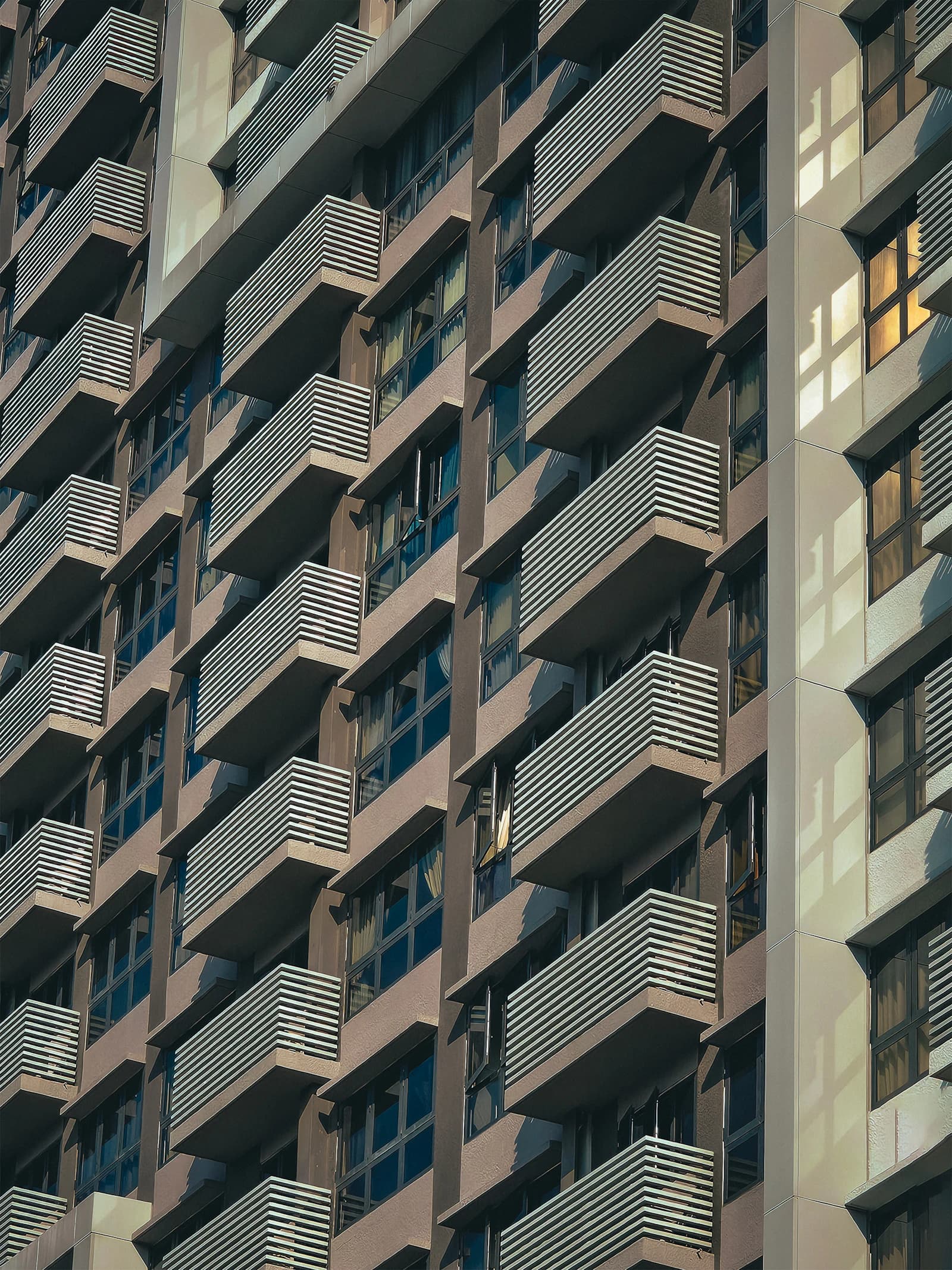 Rows of balconies on a residential apartment facade